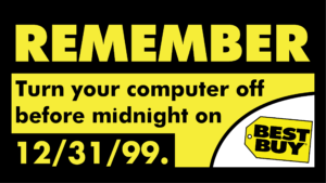A yellow and black contrast poster from Best Buy that says "REMEMBER turn your computer off before midnight on 12/31/99"
