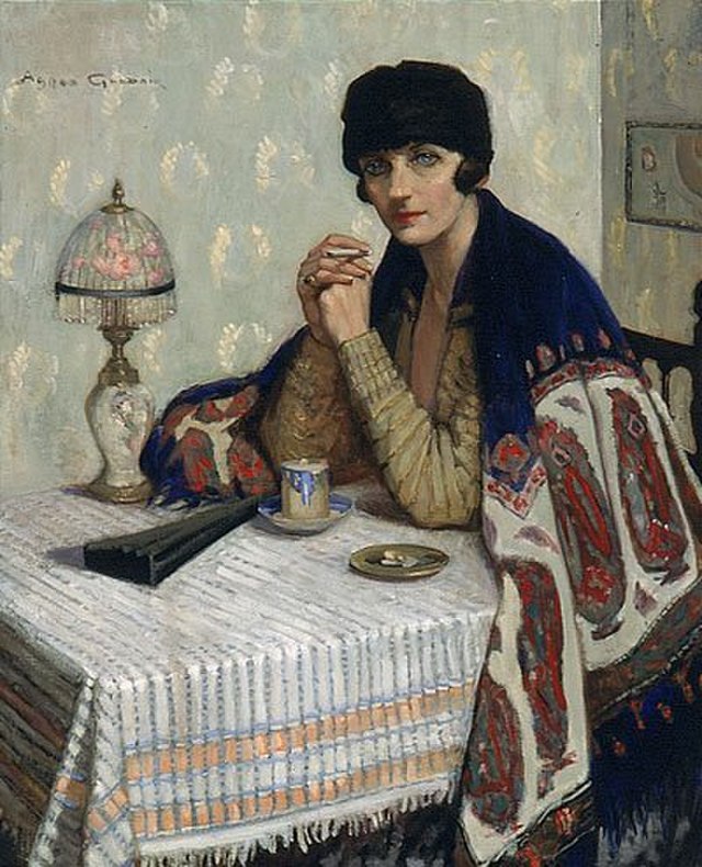 An oil painting of a woman in her late twenties eats breakfast while sitting at a table covered in a lace table cloth and holds a cigarette between her fingers. The woman looks relaxed and there's a slight smile on her face.