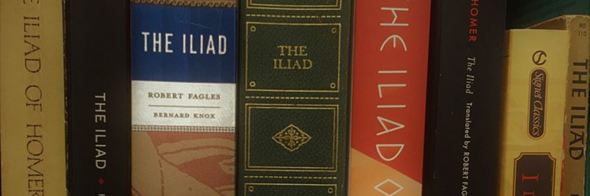 Copies of Homer's The Iliad on a bookshelf 