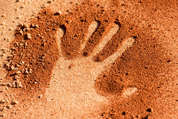handprint in red dirt